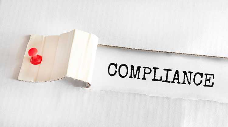 Karton mit der Aufschrift Compliance