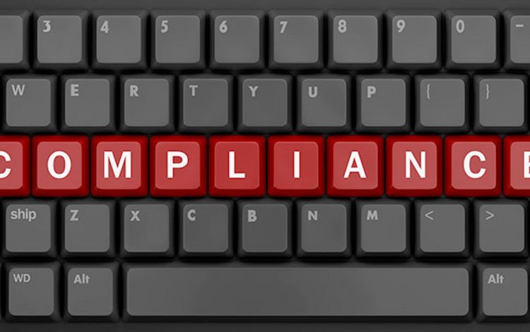 PC-Tastatur mit dem Wort: Compliance