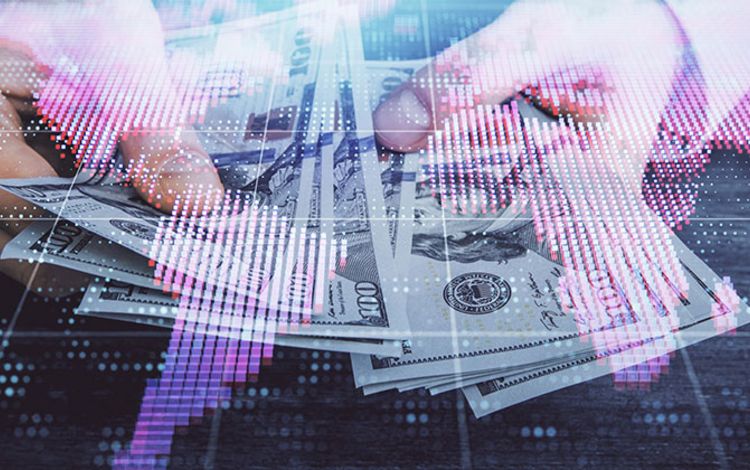 Dollarscheine und Weltkarte als Symbol für internationale Geldtransfers